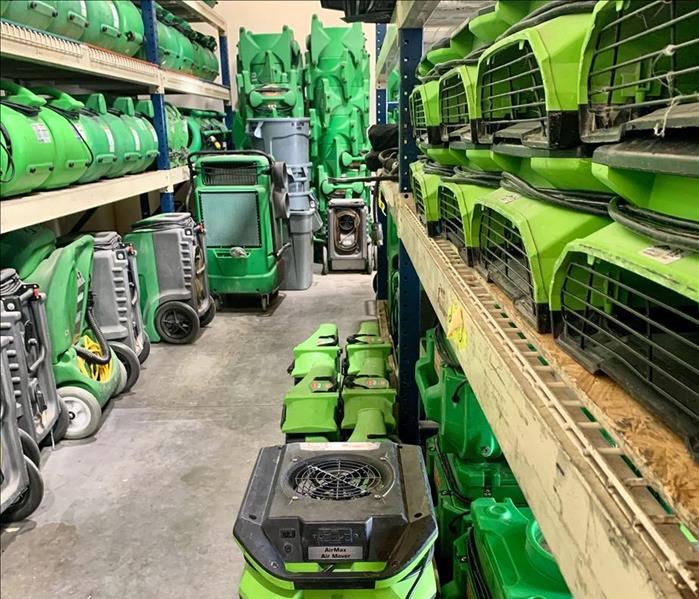 Large amount of SERVPRO drying equipment on racks