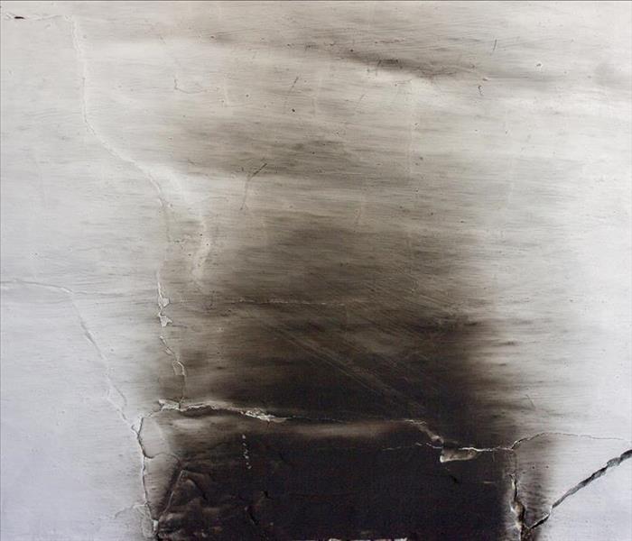soot stains on a white wall